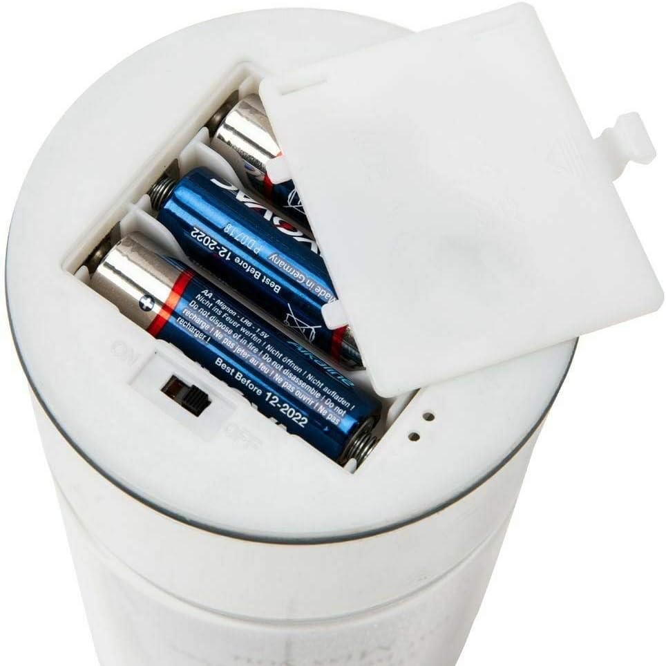 White electronic device with batteries inside on a white background