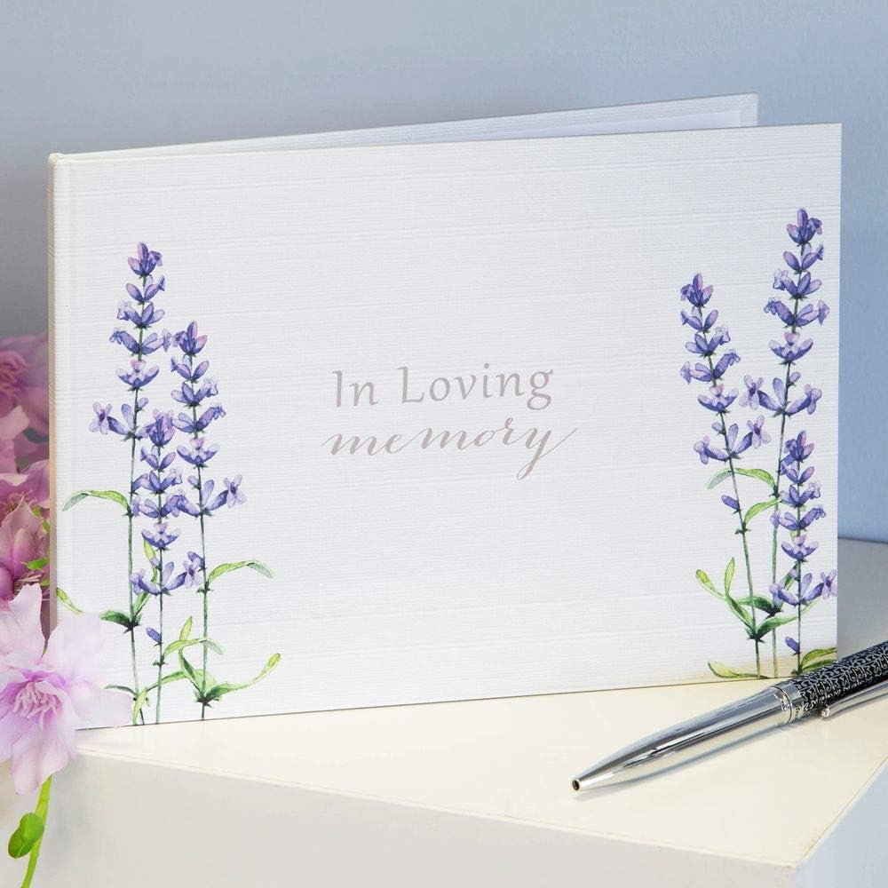 Book with lavender design and 'In Loving Memory' text on a light blue background.