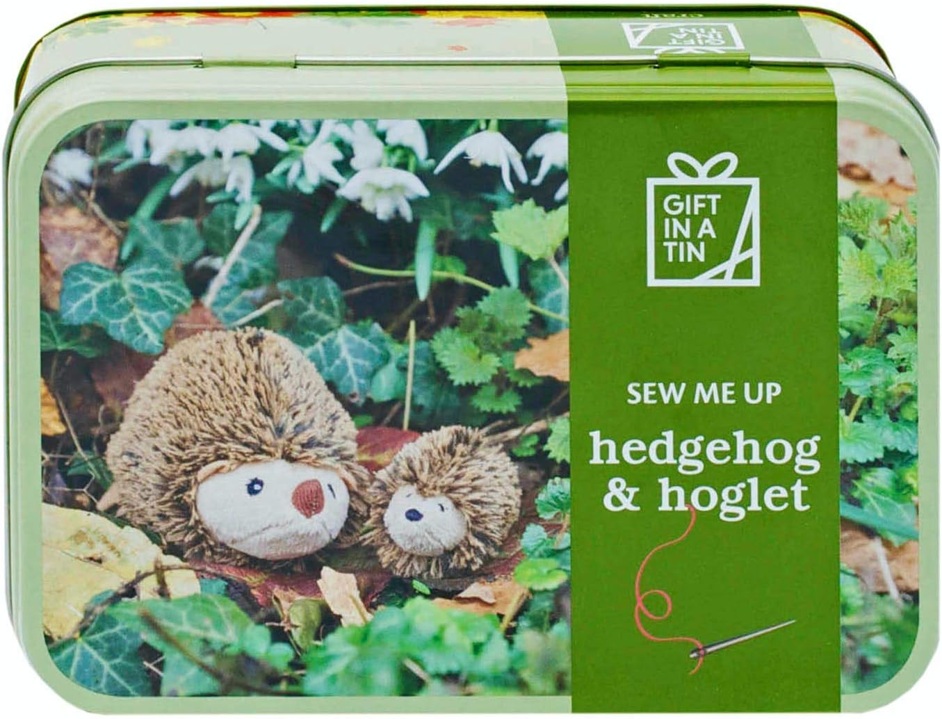 Gift in a tin with hedgehog and hoglet plush toys and sewing kit.