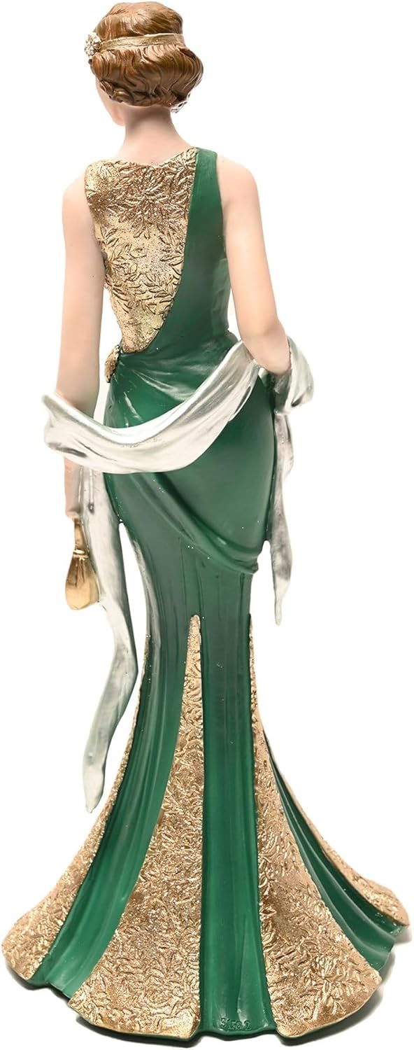 Statue of a woman in a green and gold dress with a white sash on a white background