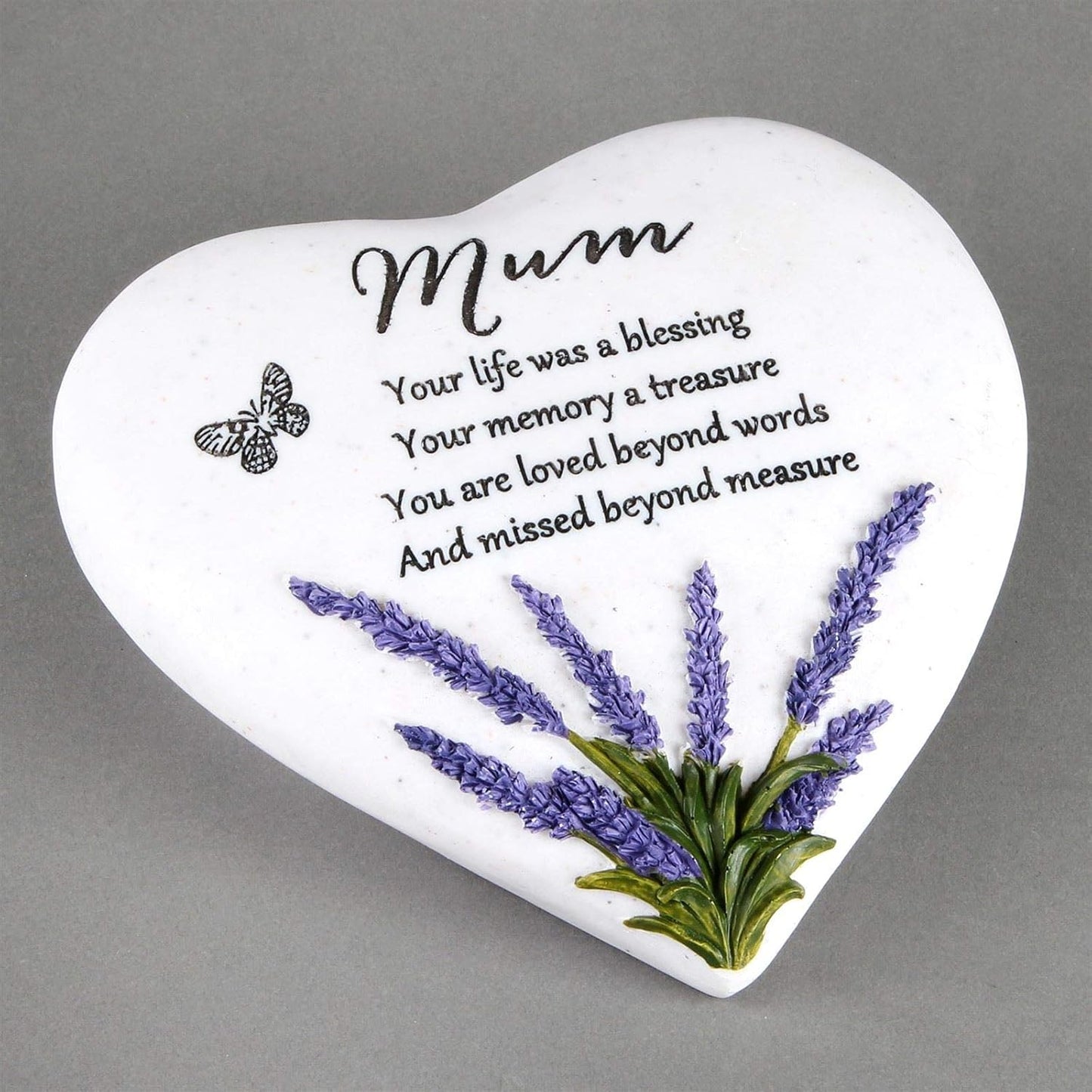 Heart-shaped plaque with lavender design and text on a gray background
