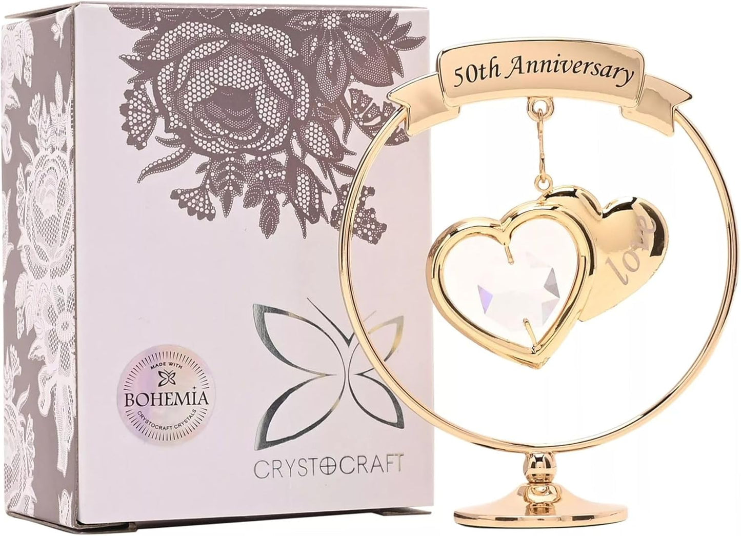 Gold heart-shaped ornament with '50th Anniversary' banner next to Bohemia Crystocraft packaging.
