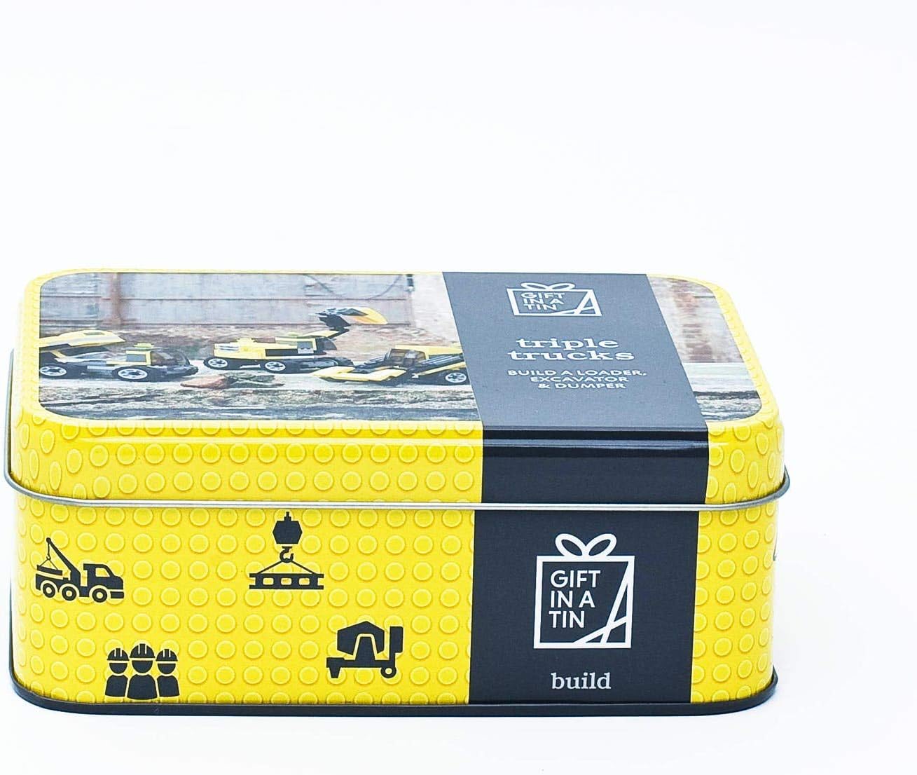 Yellow and black tin box with construction-themed design on a white background