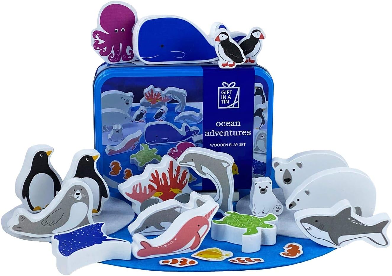 Wooden toy set with ocean-themed figures in front of a blue tin labeled 'Ocean Adventures'.