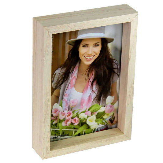 Wooden photo frame with a picture of a woman wearing a hat and scarf.