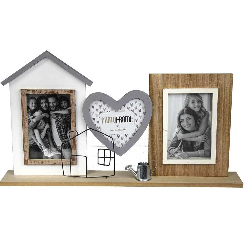 A wooden multi-photo frame with a natural finish, featuring a heart-shaped aperture in the center, a small house, and a watering can. It has two larger apertures on the sides for photos.