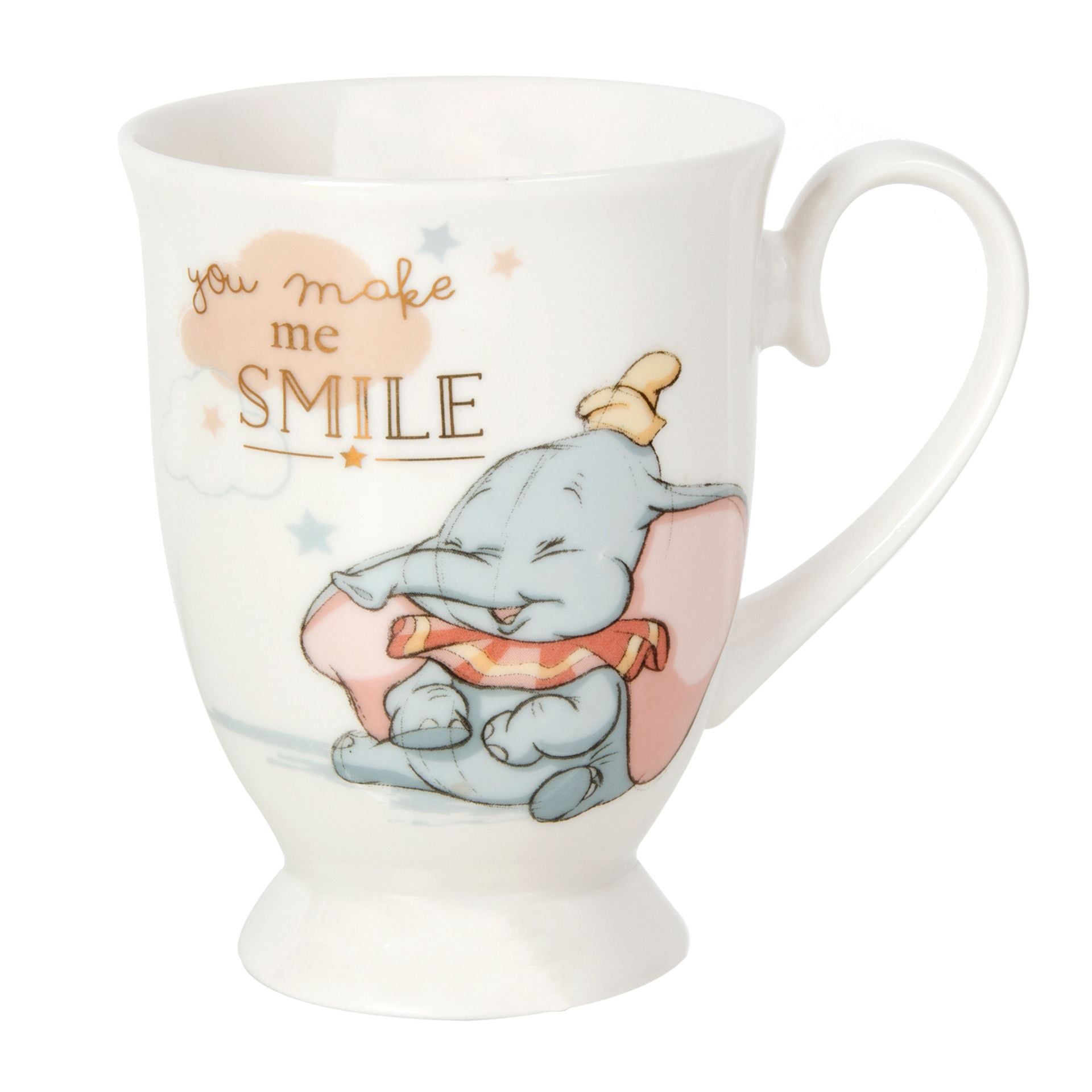 A white porcelain mug with an illustration of a baby-sized elephant character, presumably Dumbo, with the text 'You make me smile' in gold foil lettering.