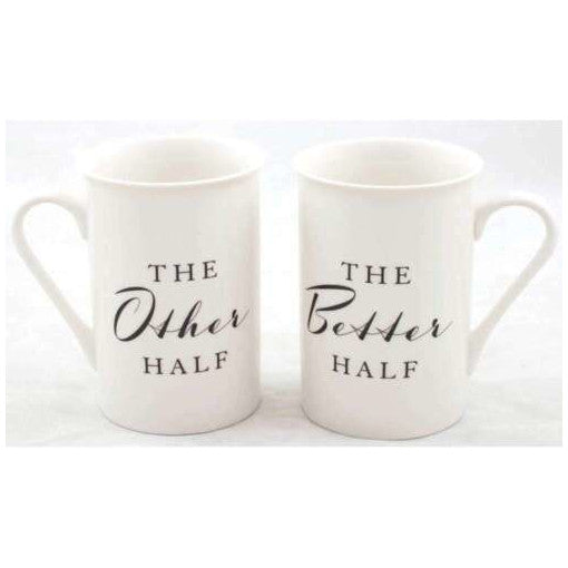A pair of white stoneware mugs with black text, one reading 'THE OTHER HALF' and the other 'THE BETTER HALF'.