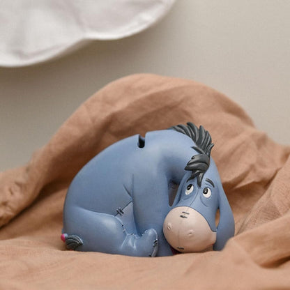 Eeyore Money Box on brown blanket