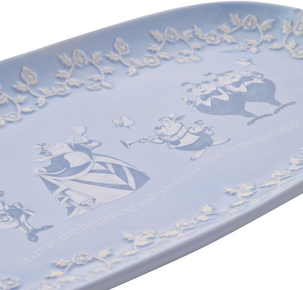 Decorative tray with fairy tale design on a light blue background