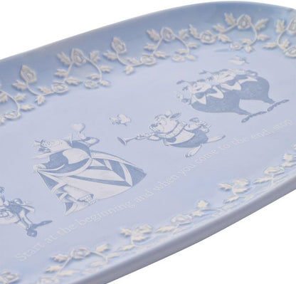 Decorative tray with fairy tale design on a light blue background