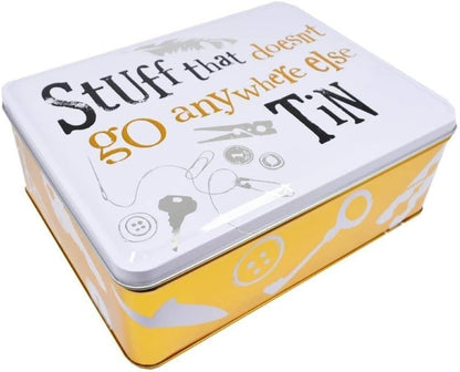 Metal tin with text 'Stuff that doesn't go anywhere else' on a white background