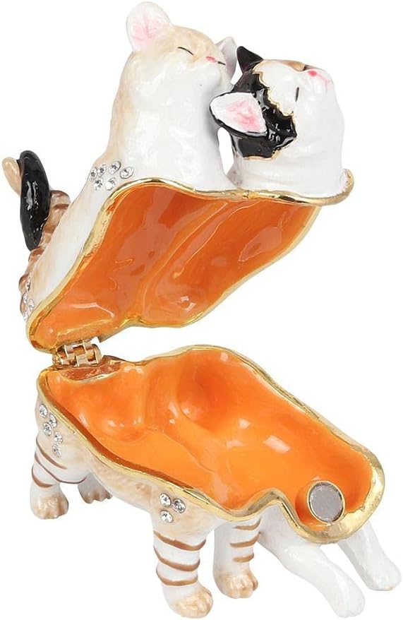 Decorative box shaped like a cake open with an orange interior 