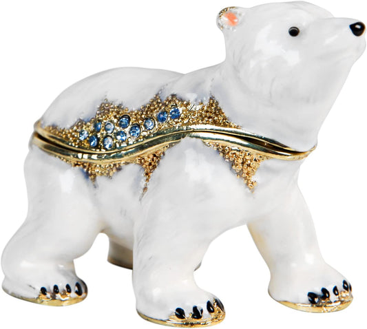 Decorative polar bear figurine with gemstone collar on a white background