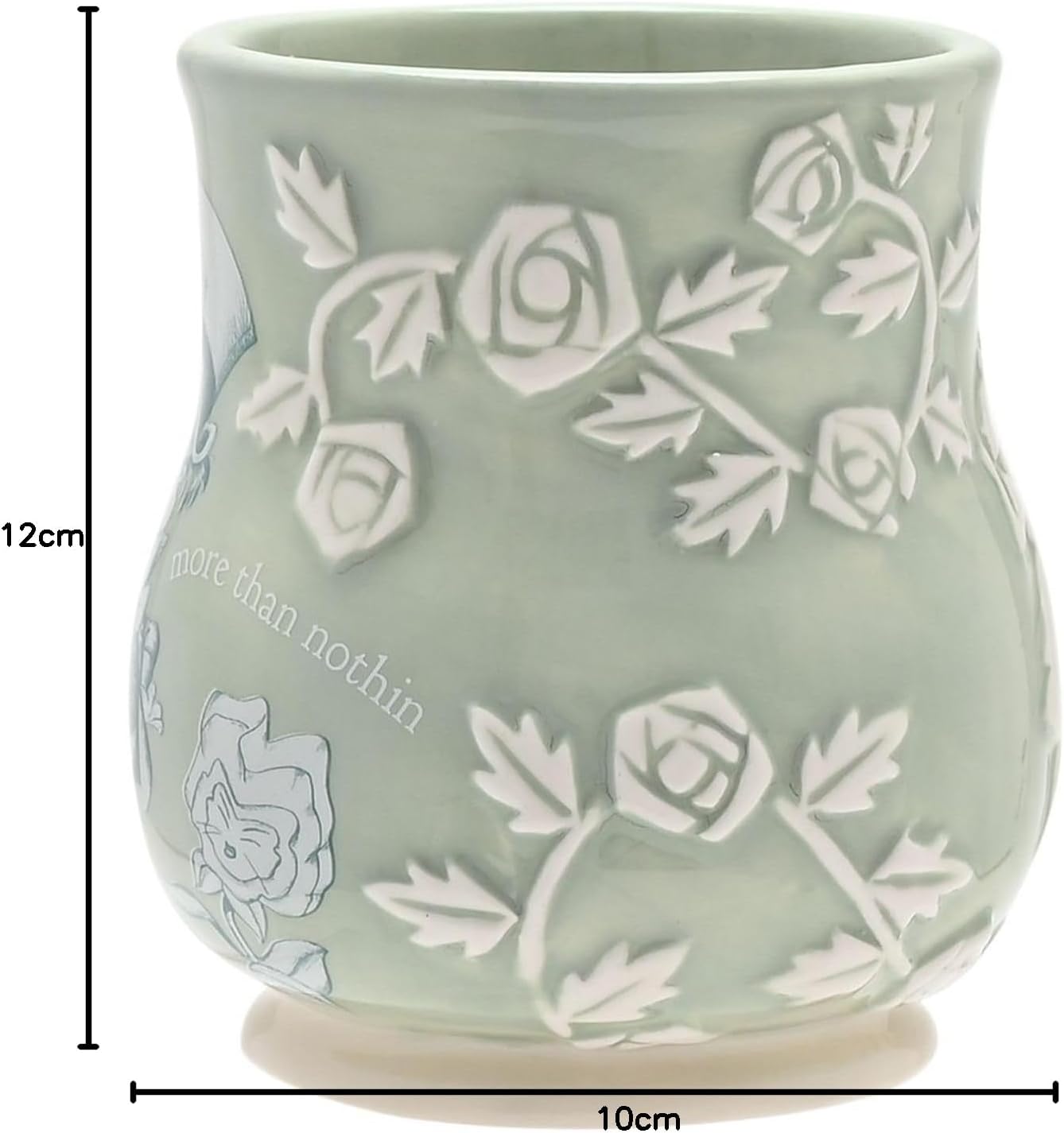 Green ceramic mug with floral patterns and 'more than nothin' text, shown with measurements.