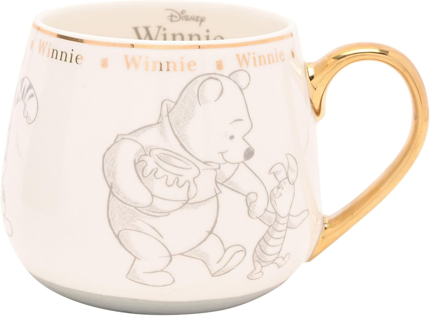 Winnie the Pooh mug with gold handle on a white background