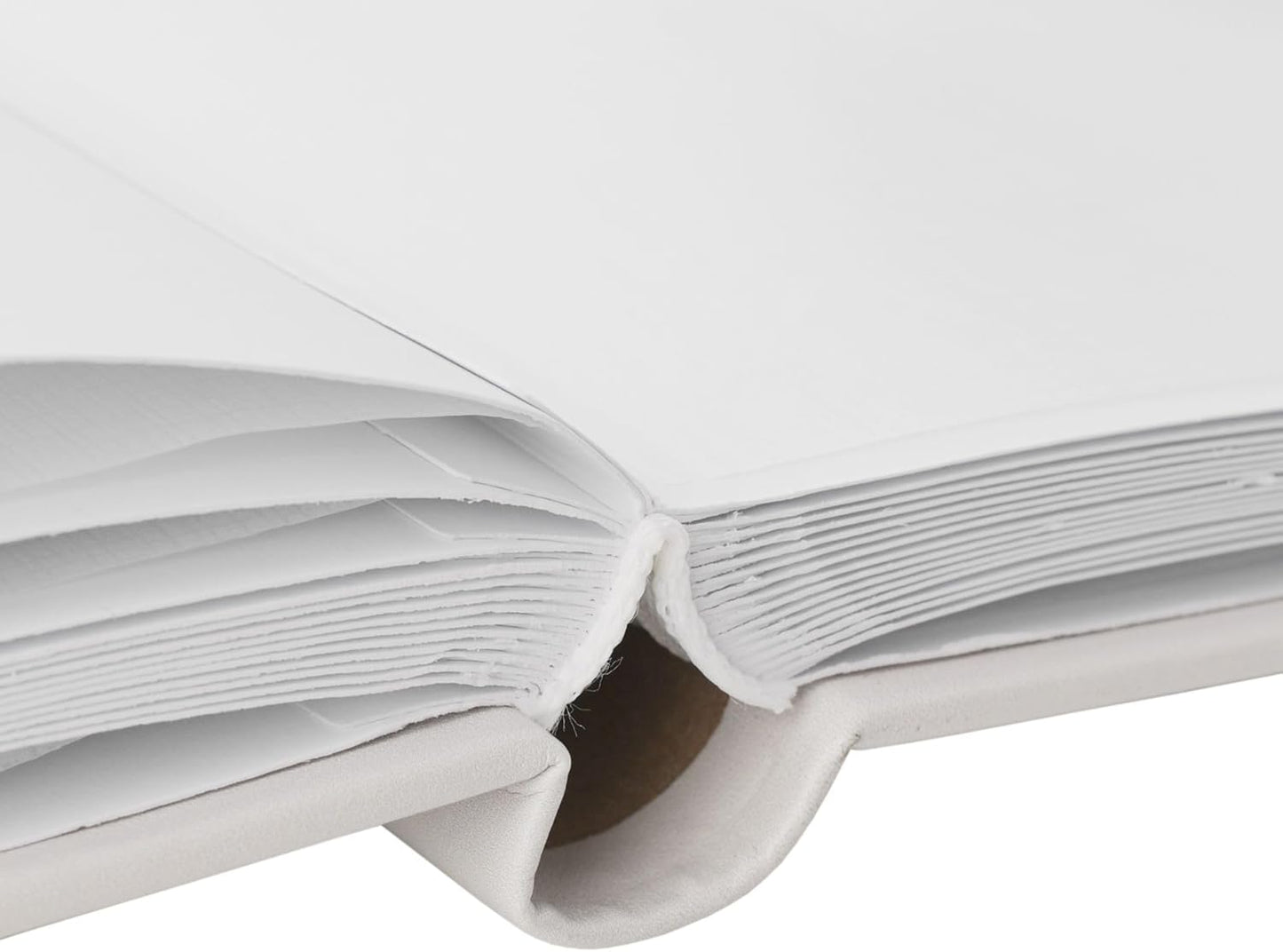 Close-up of a white book with a white background