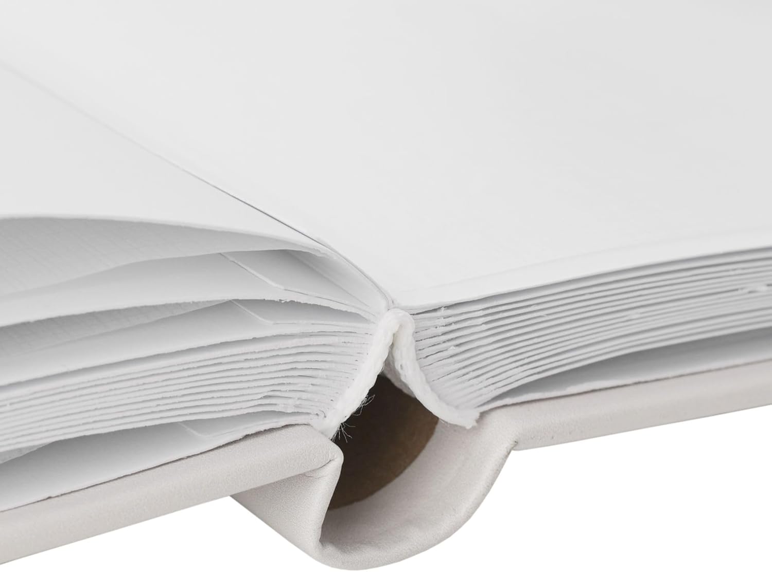 Close-up of a white book with a white background