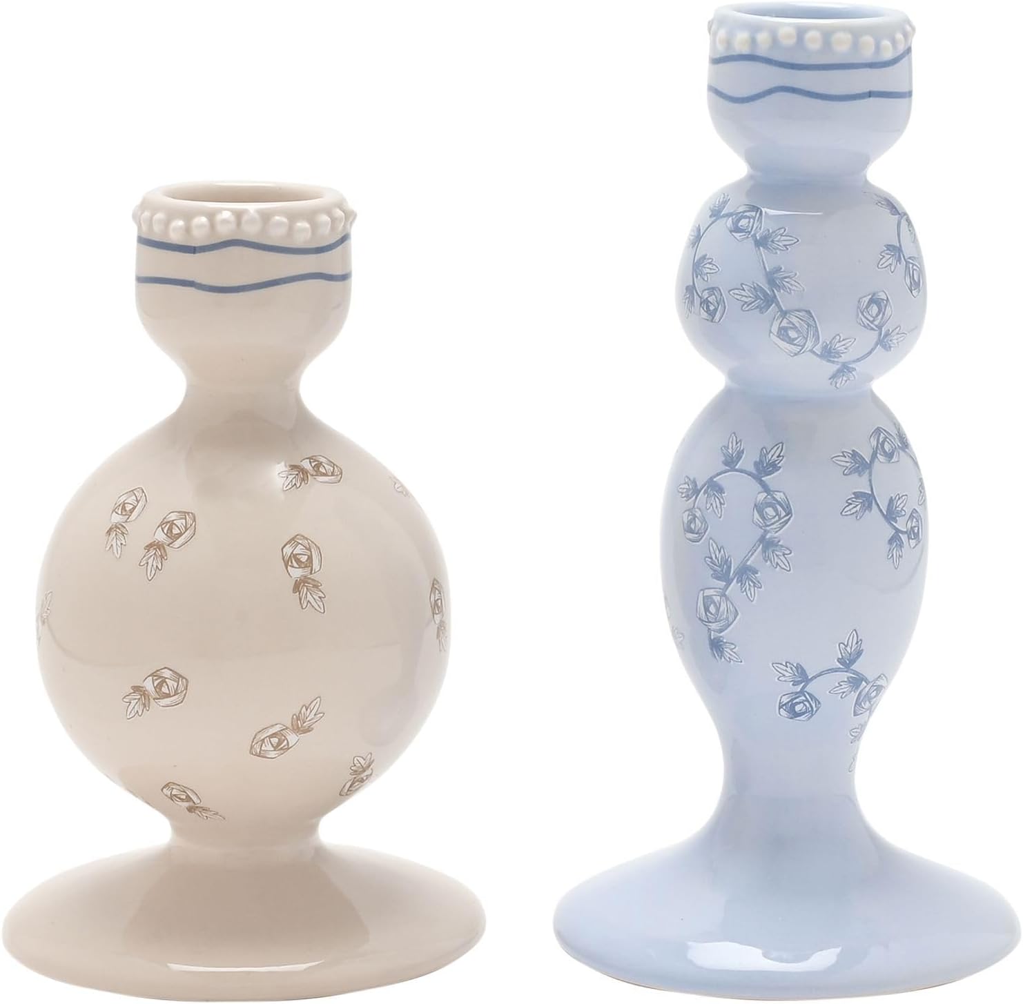 Two decorative candle holders, one beige and one light blue, with floral patterns on a white background.