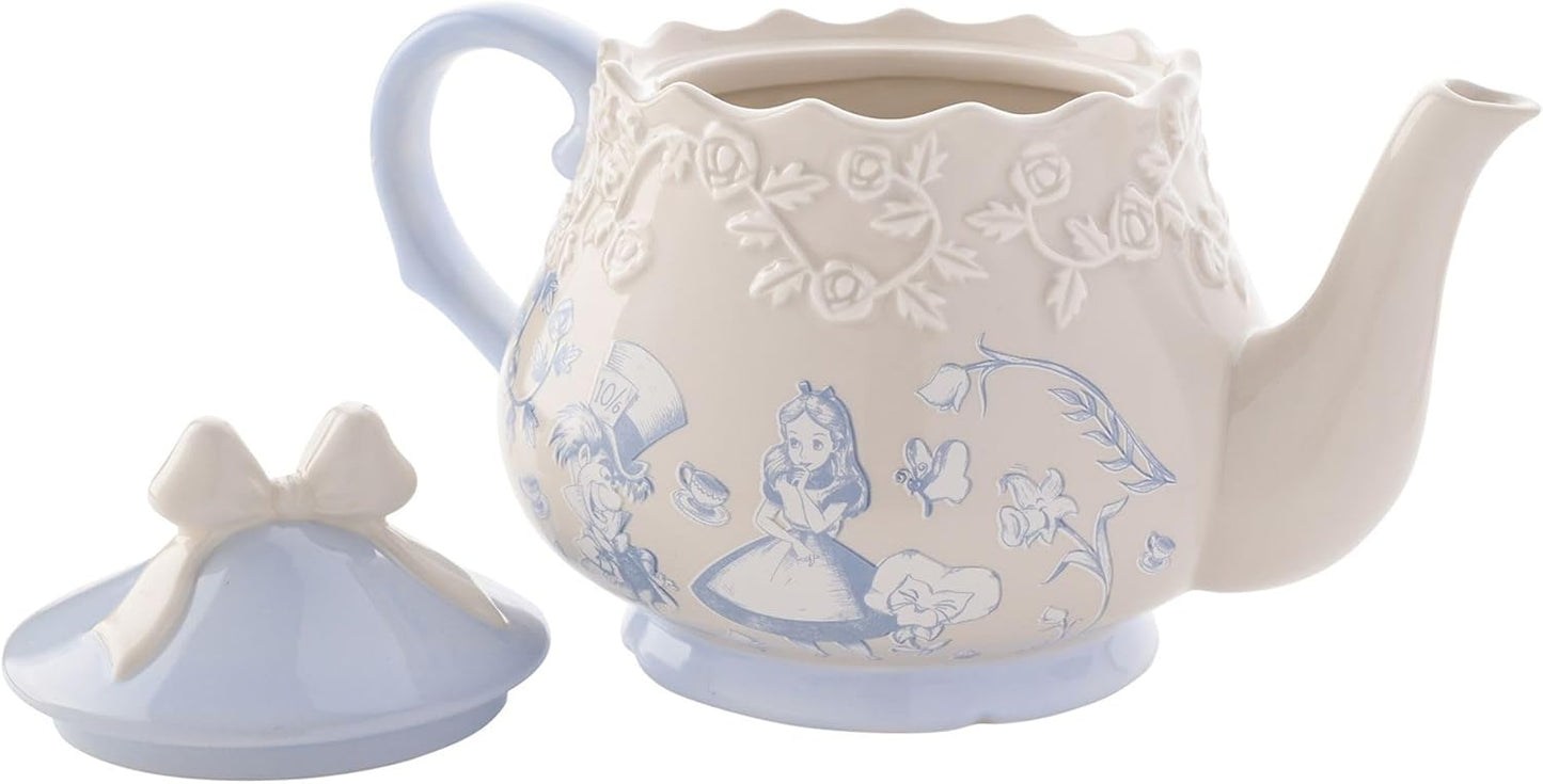 Decorative teapot with floral patterns on a white background