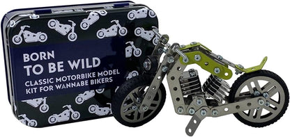 Motorcycle model kit with 'Born to be Wild' text and tin box on a white background