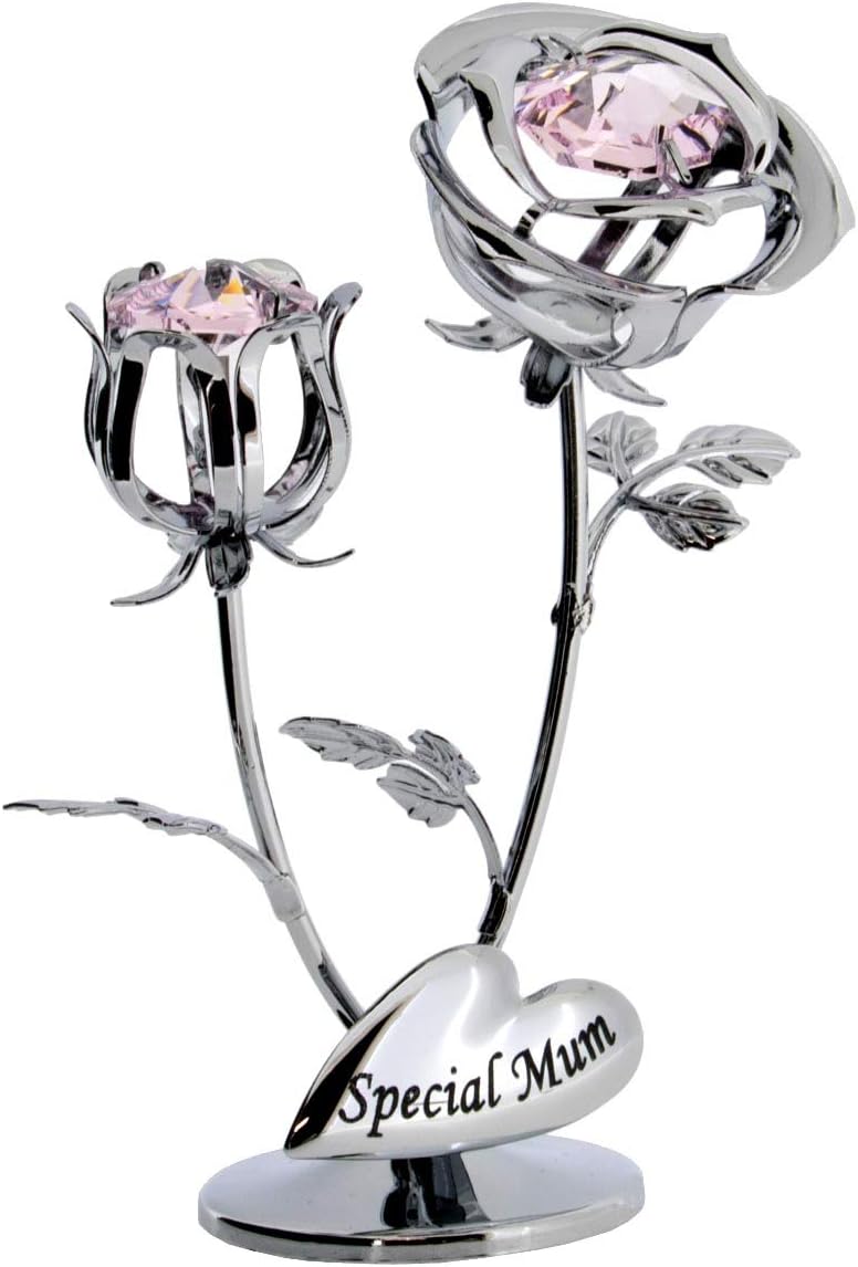 Silver rose with pink gemstones on a white background
