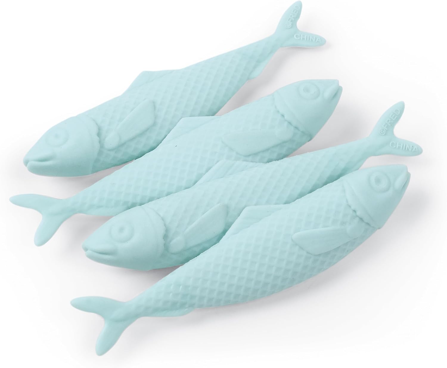 Set of four light blue fish-shaped objects on a white background