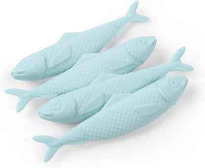 Set of four light blue fish-shaped objects on a white background