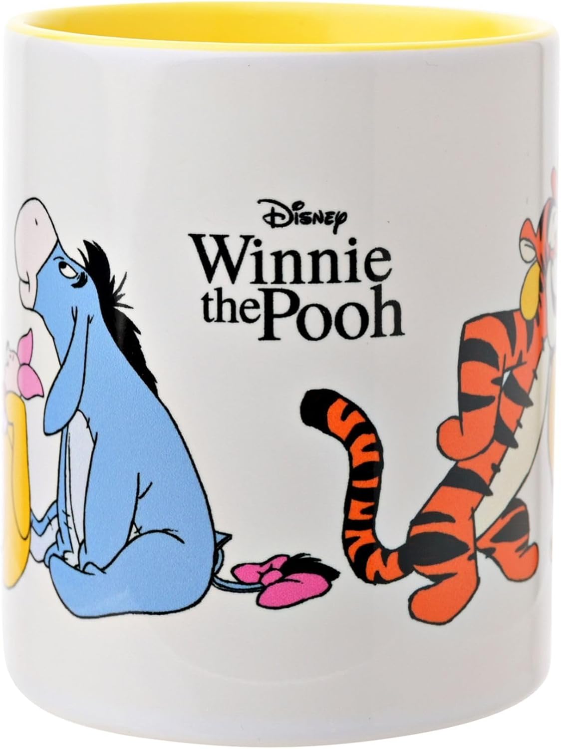 Winnie the Pooh mug with Eeyore and Tigger on a white background
