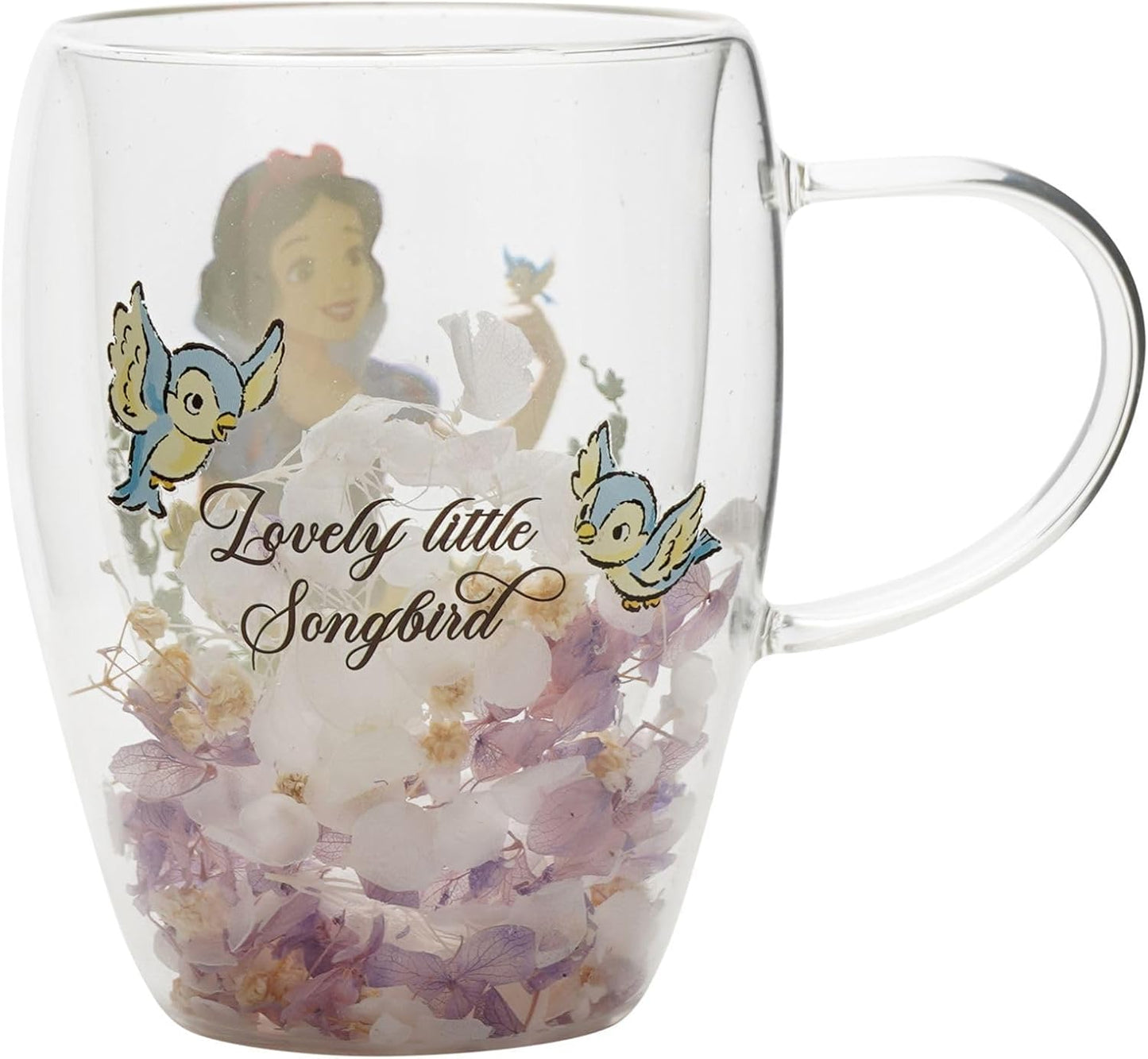 A clear glass double-walled mug featuring a printed design of Snow White with the text 'Lovely little Songbird' and bluebirds, filled with white and purple flowers inside.