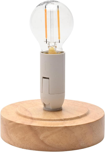 A modern table lamp featuring a round, light-colored wooden base and a translucent glass globe bulb with visible filament elements, set against a plain white background.