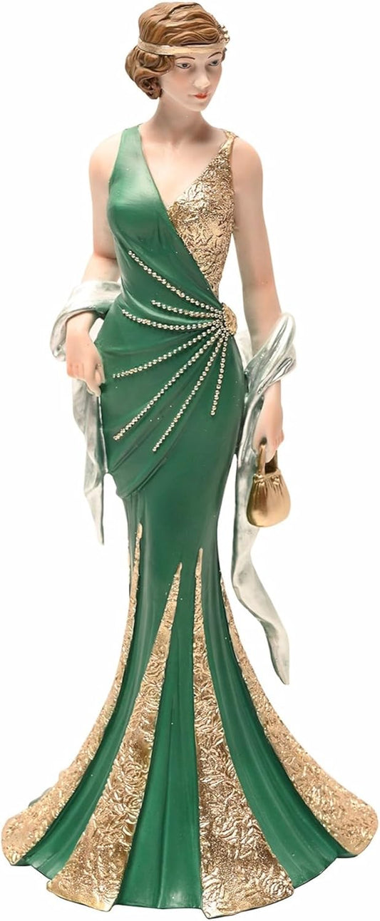Woman in a green and gold evening gown with decorative elements