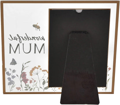 Back of picture frame with floral design on a white background