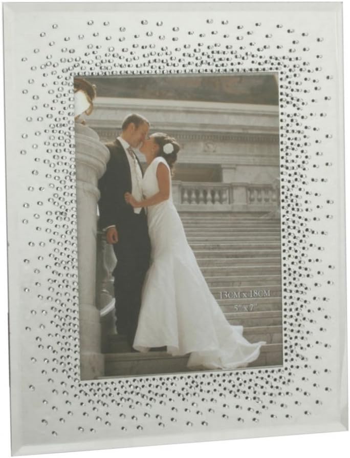 Decorative photo frame with a couple kissing on a staircase