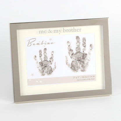 Framed handprint kit with 'me & my brother' text on a white background