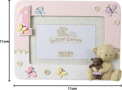 Decorative photo frame with teddy bear and butterfly designs, featuring measurements.