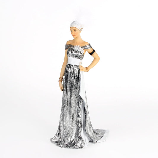 Mannequin wearing a silver and white evening gown on a white background