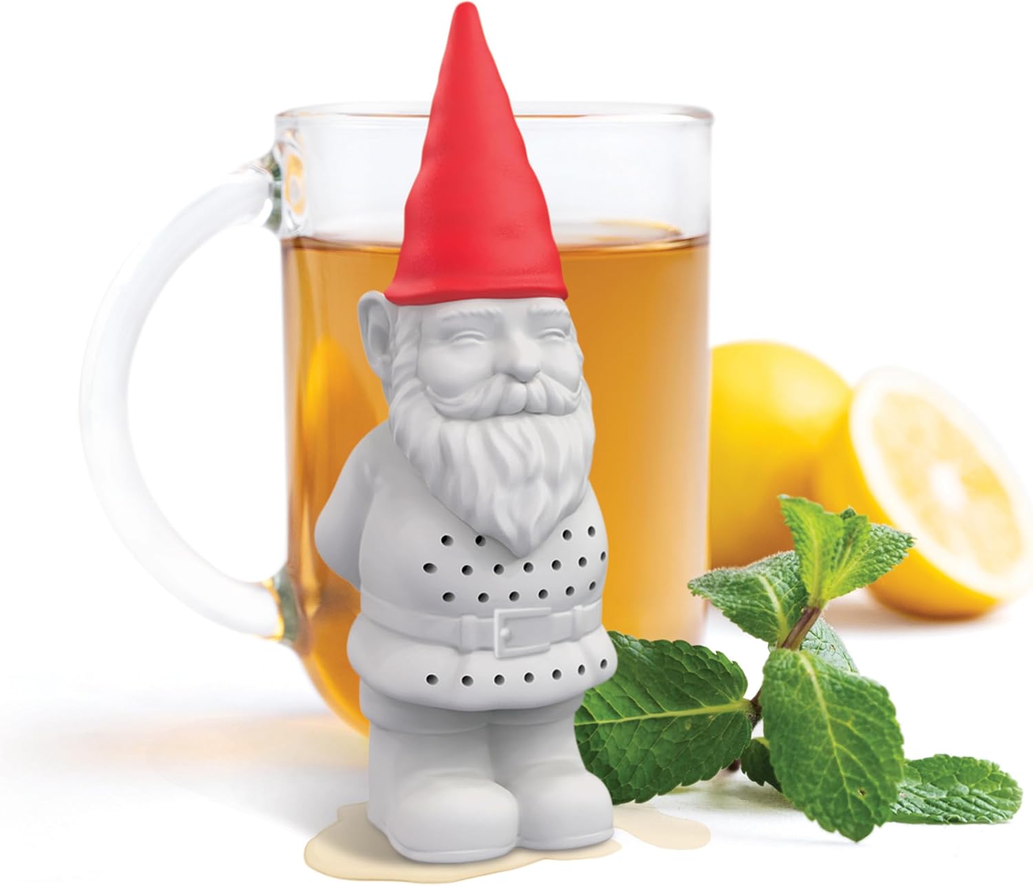Gnome-shaped tea infuser with a glass of tea and lemon slices on a white background