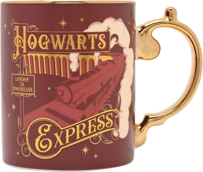 A Harry Potter Hogwarts Express ceramic mug with a dark red body, gold lettering, and a gold handle, shown on a white background.