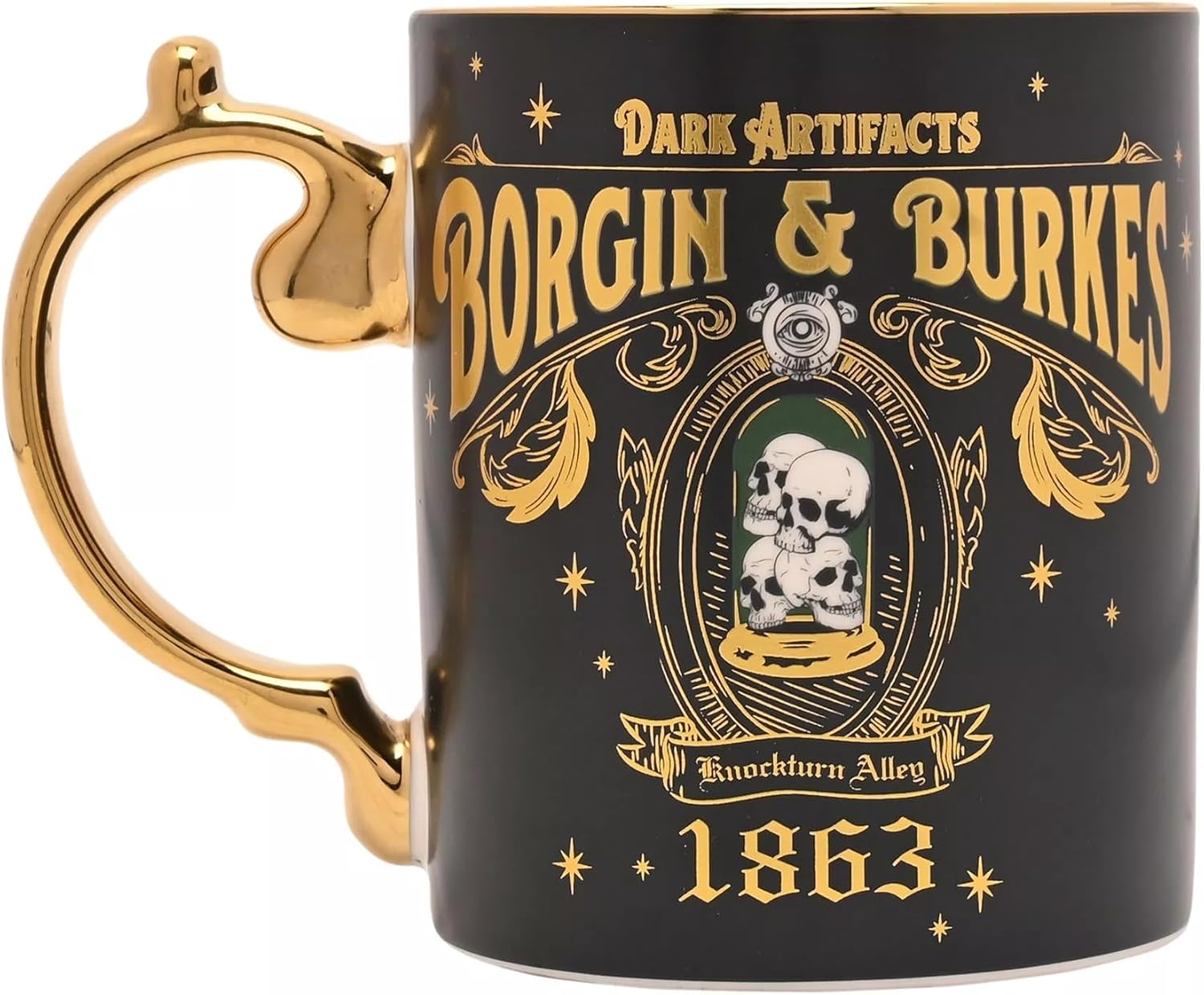 A black ceramic mug with a gold handle and gold printed gothic-style text reading 'Borgin & Burkes', 'Dark Artifacts', 'Knockturn Alley', and '1863', plus an illustration of skulls under a glass dome.