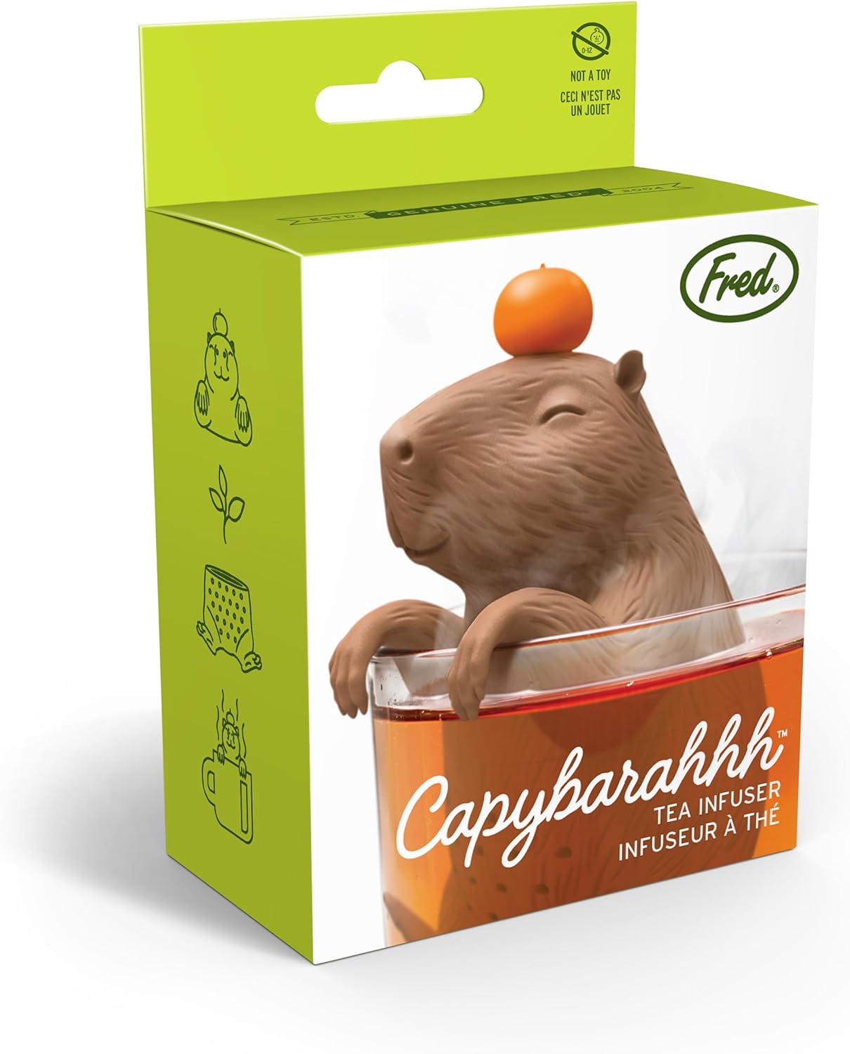 Capybara-shaped tea infuser with packaging on a white background