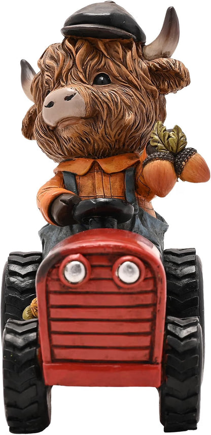 A Highland cow figurine driving a red tractor, wearing an orange shirt and blue overalls, set against a plain white background.