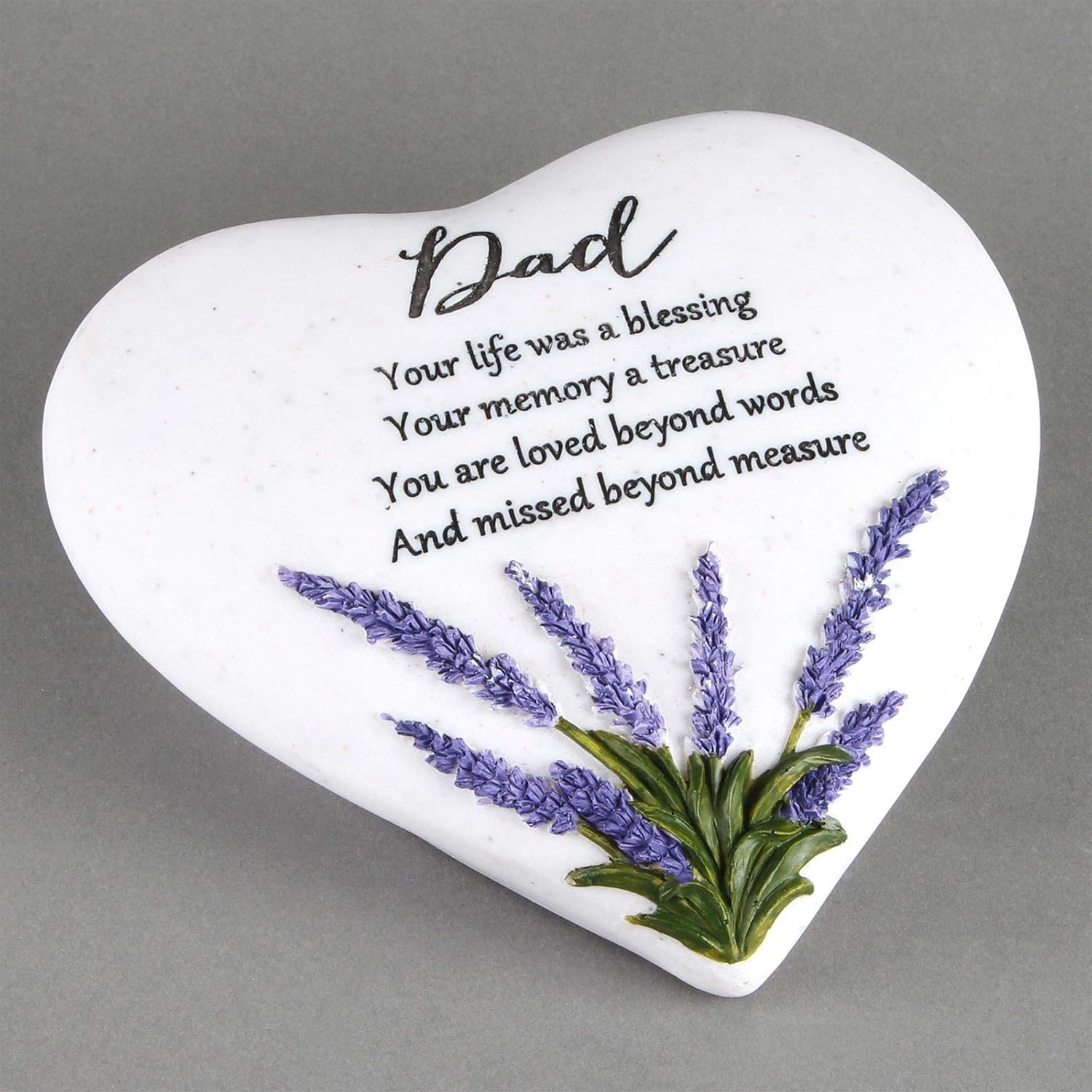 Heart-shaped white plaque with lavender design and text on a gray background