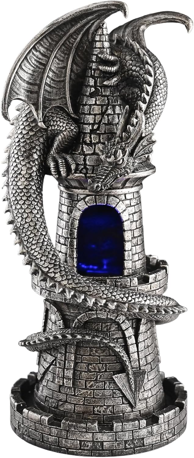 Decorative dragon sculpture with a blue light inside a tower