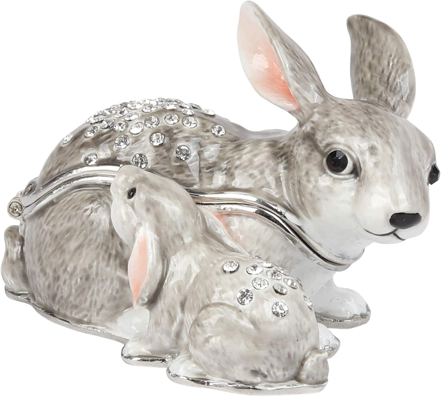 Decorative rabbit-shaped box with crystals on a white background