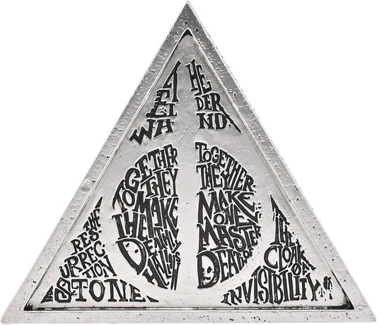 Triangular metal sign with engraved text on a white background