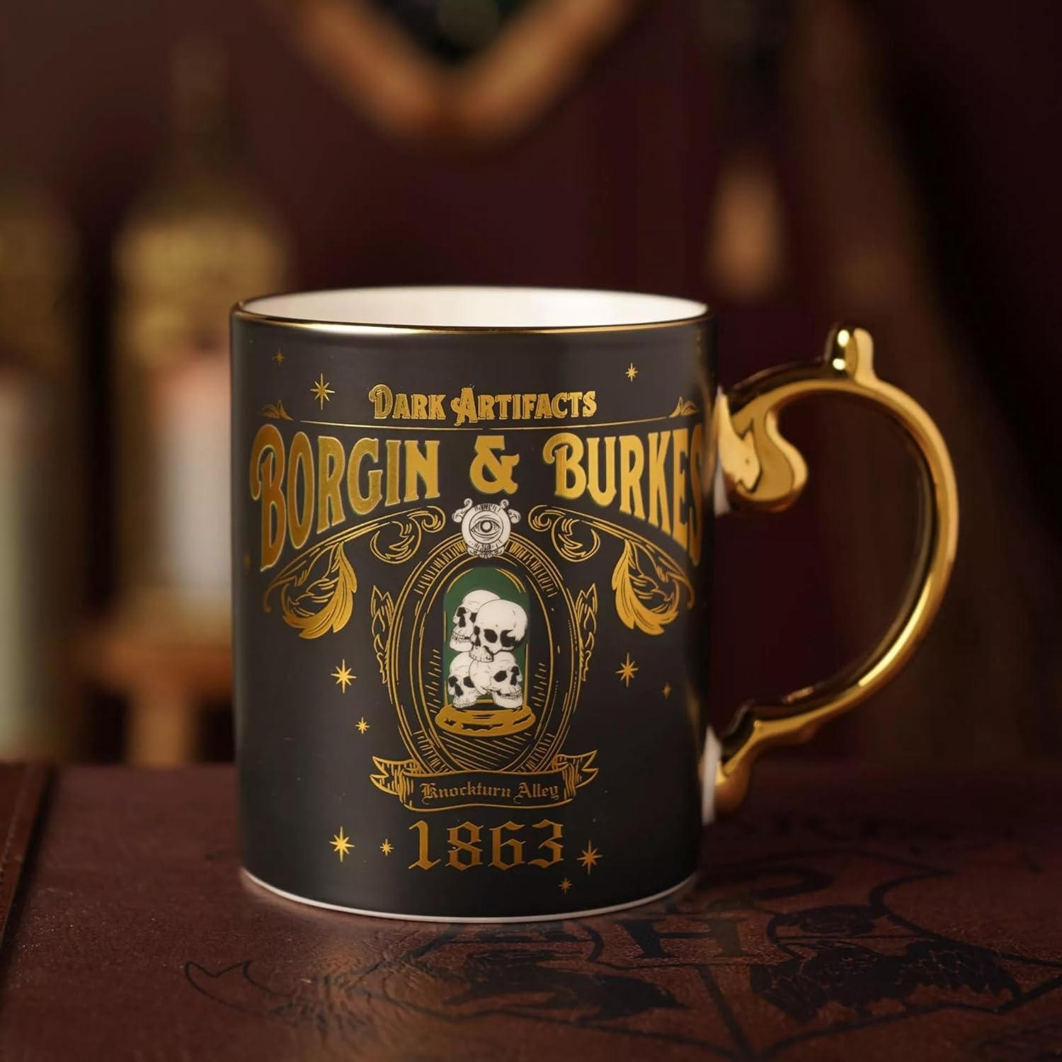 Decorative mug with 'Borgin & Burkes' design on a dark background