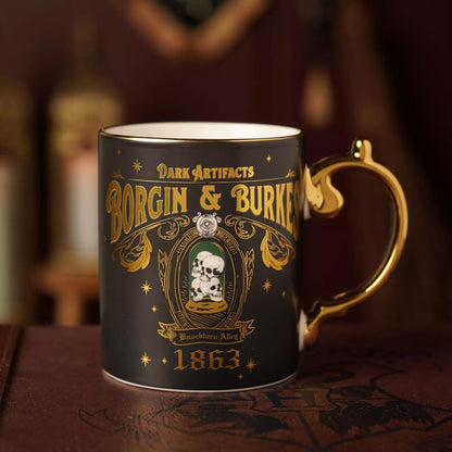 Decorative mug with 'Borgin & Burkes' design on a dark background