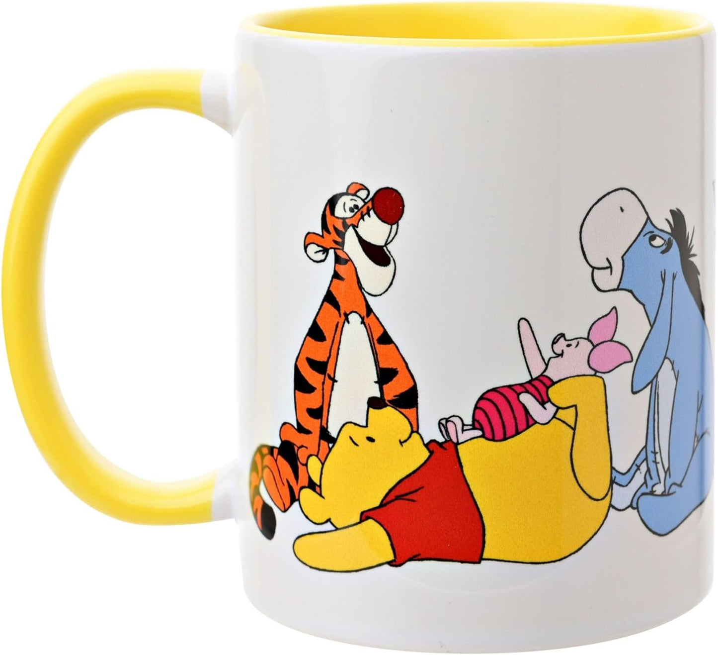 Mug with cartoon characters including Pooh, Tigger, and Eeyore on a white background.