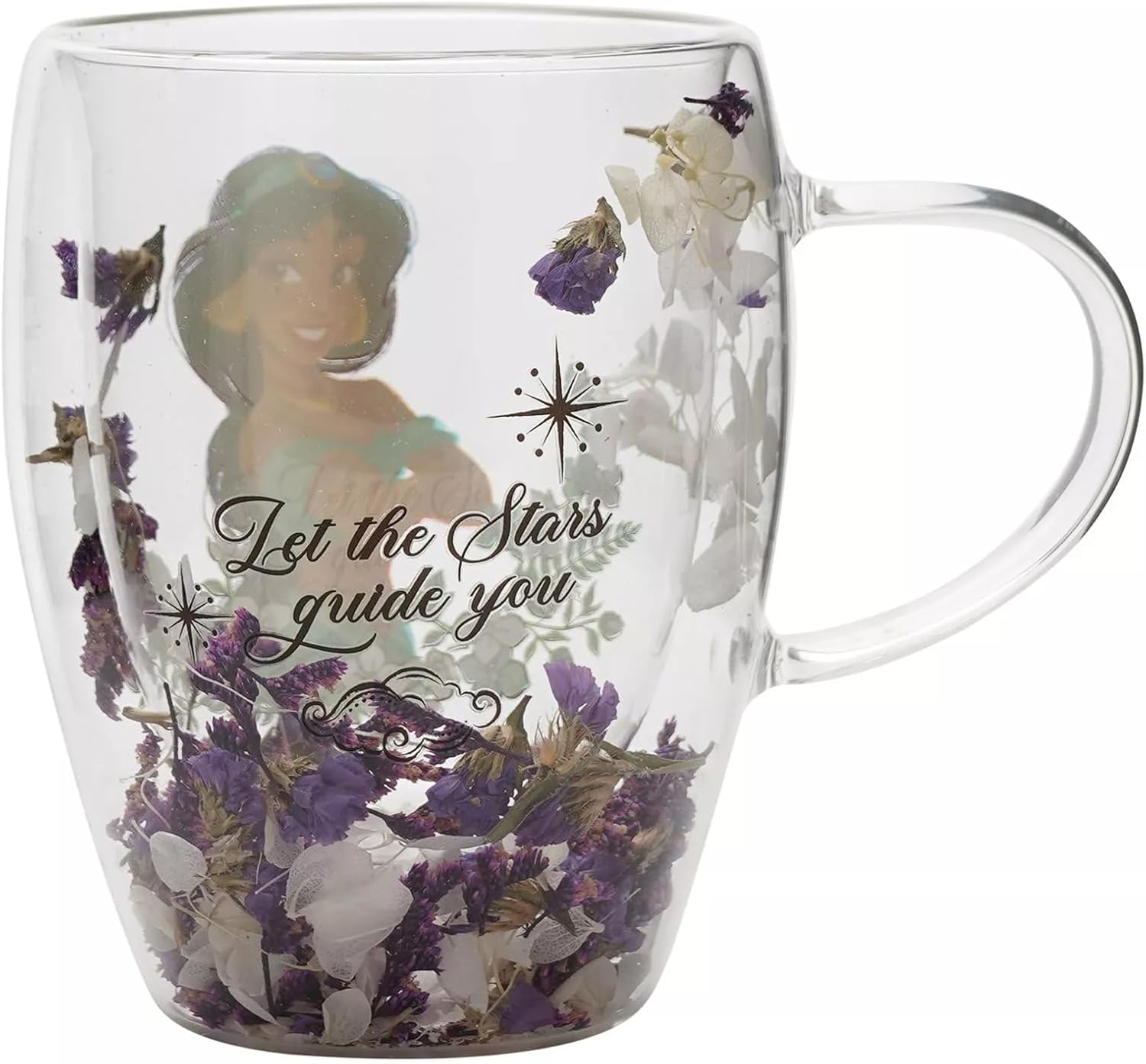 A clear glass mug featuring a printed illustration of Jasmine from Aladdin, the phrase 'Let the Stars guide you' in black script, and dried purple and white flowers embedded inside the glass.